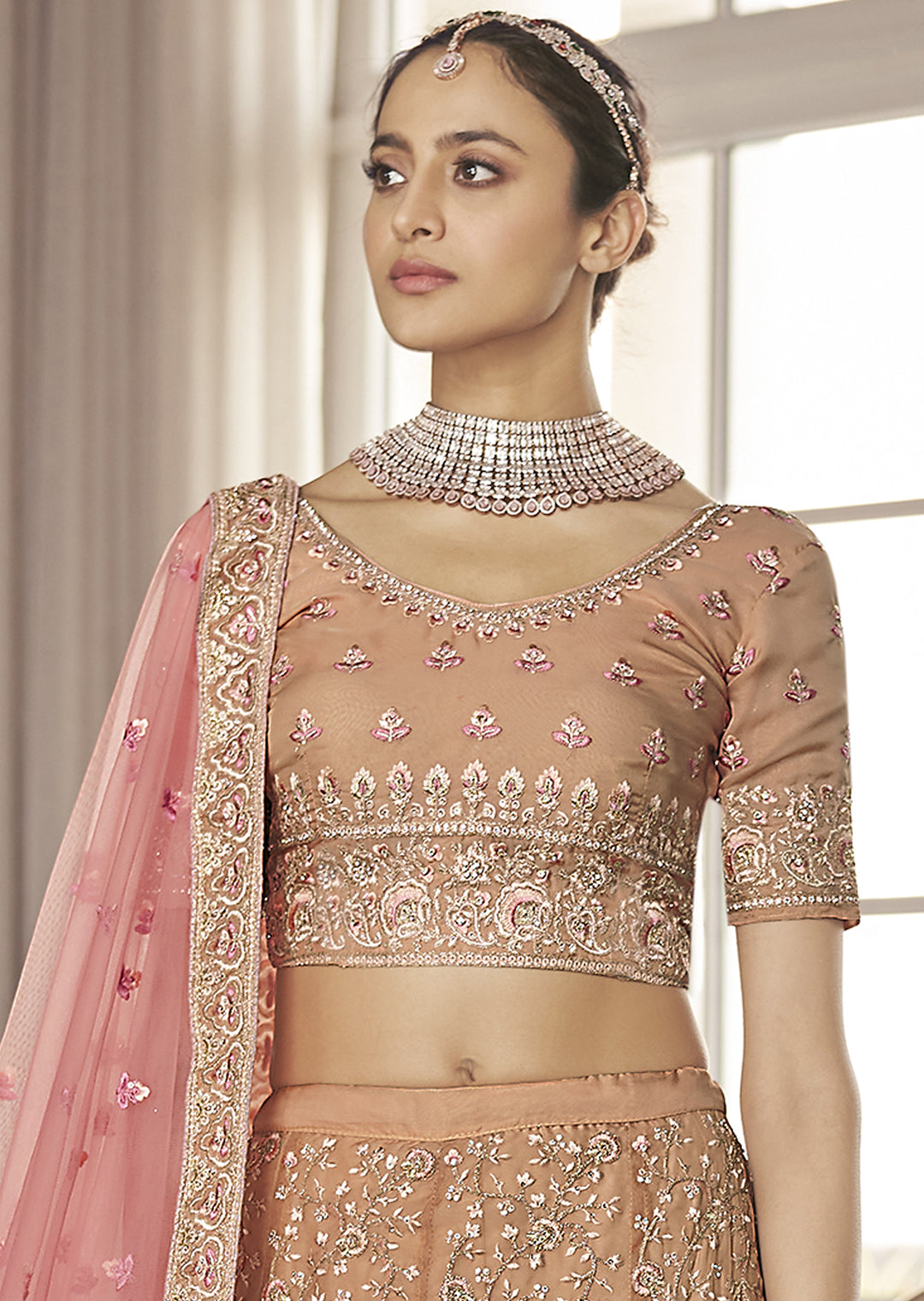 GOLDEN PEACH HEAVY EMBROIDERED DESIGNER LEHENGA