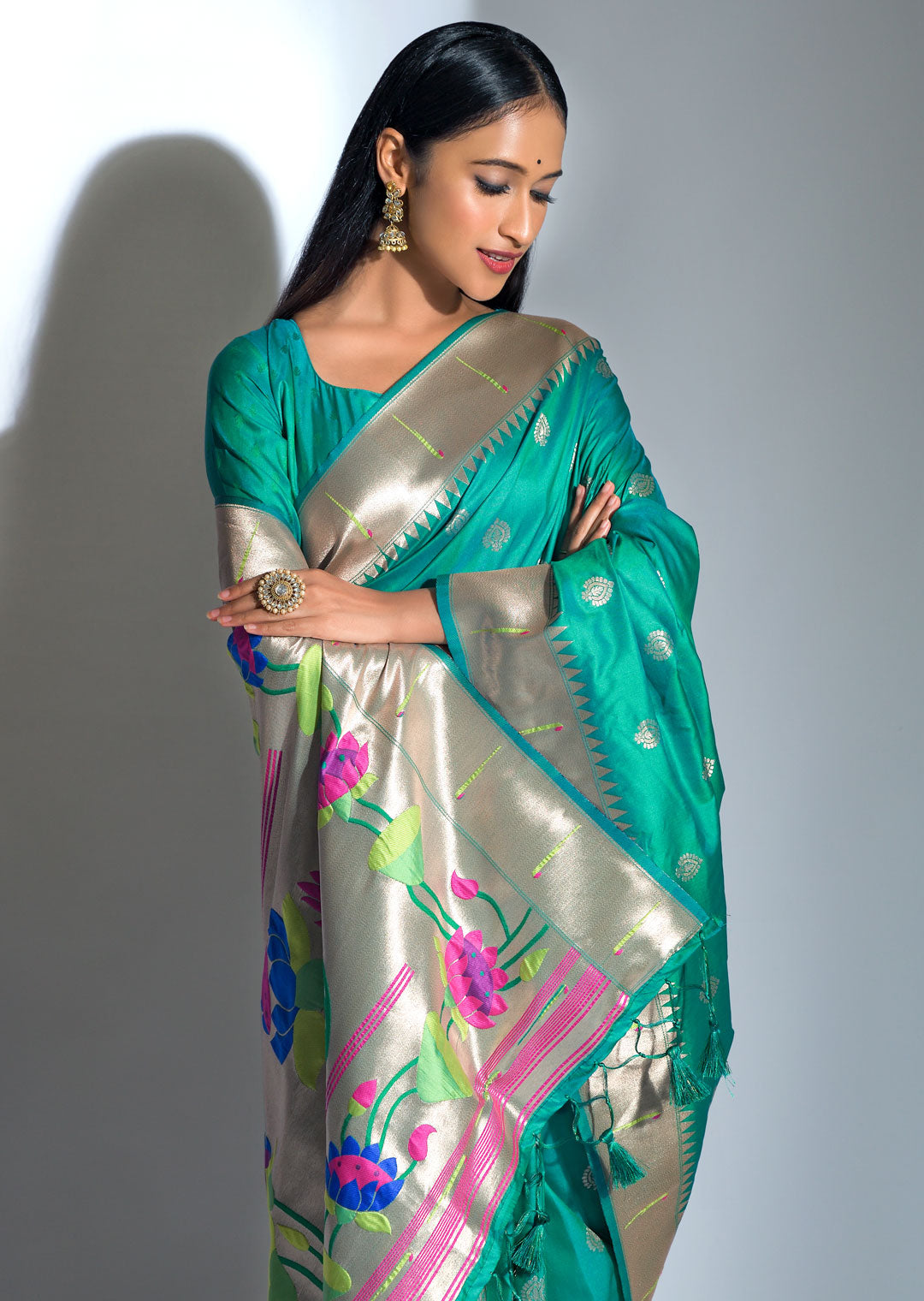 TURQUOISE GREEN ZARI WOVEN TRADITIONAL PAITHANI SILK SAREE