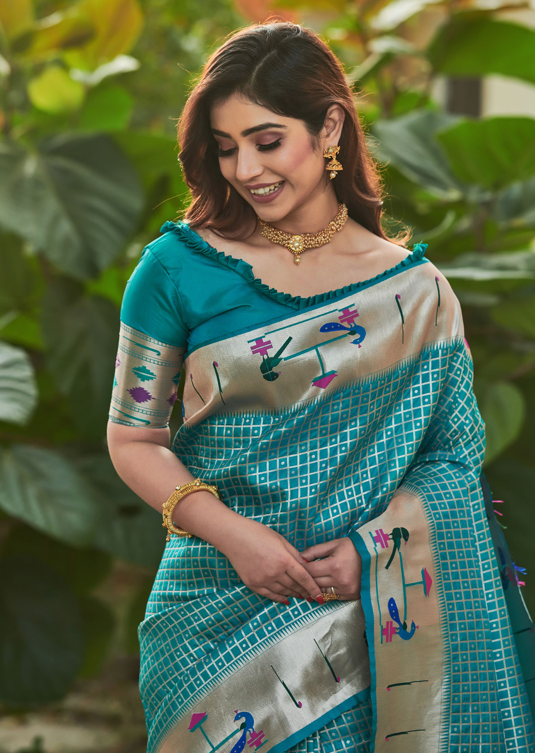 TURQUOISE GREEN ZARI WOVEN TRADITIONAL PAITHANI SILK SAREE