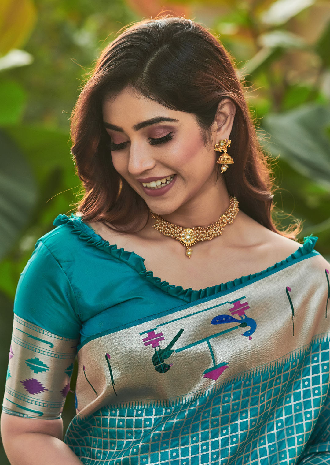 TURQUOISE GREEN ZARI WOVEN TRADITIONAL PAITHANI SILK SAREE