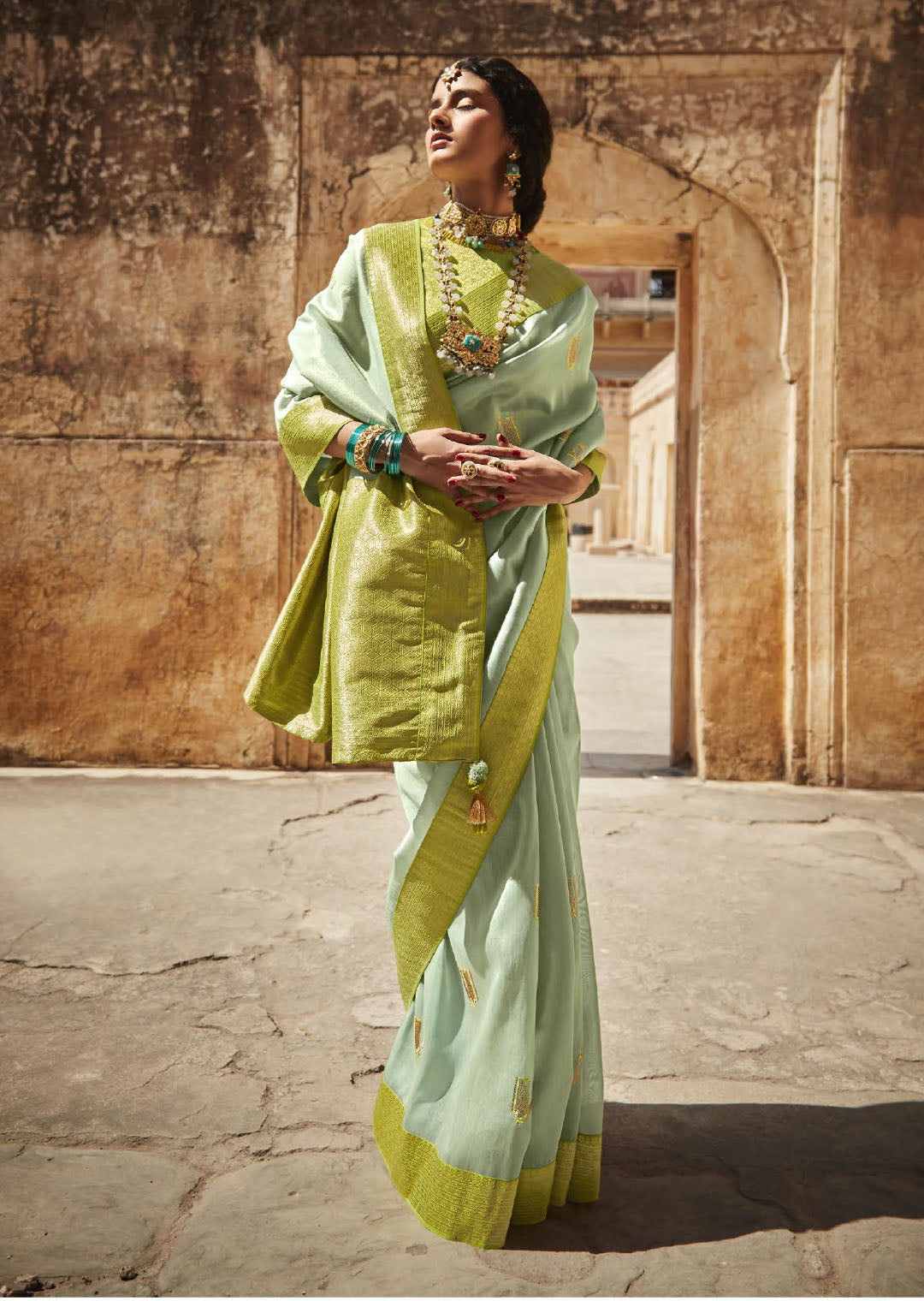 Mint Green Woven Designer Saree With Heavy Embroidered Blouse