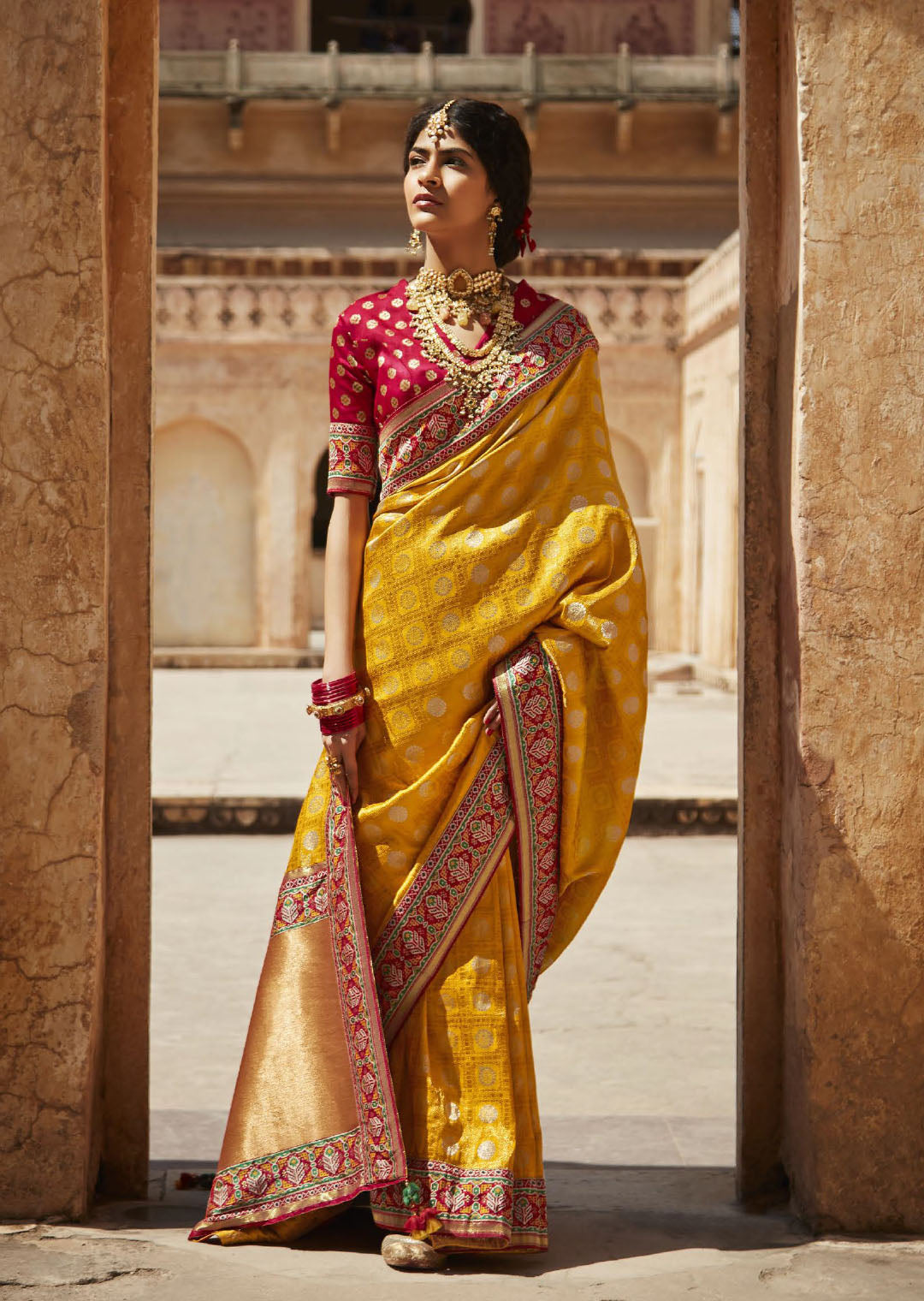 Mustard Yellow Woven Traditional Silk Saree With Heavy Embroidered